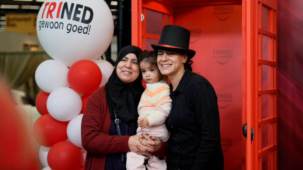 Bezoekers poseren in de Trined Photobooth tijdens Huishoudbeurs 2026